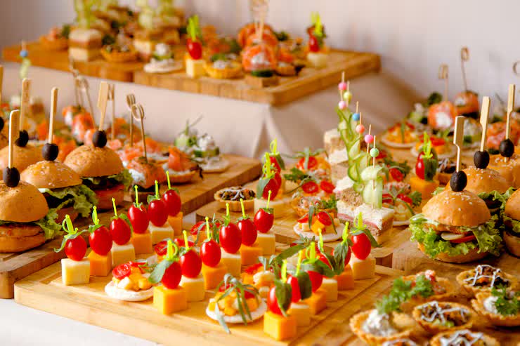 Guests enjoying a shared meal at an event